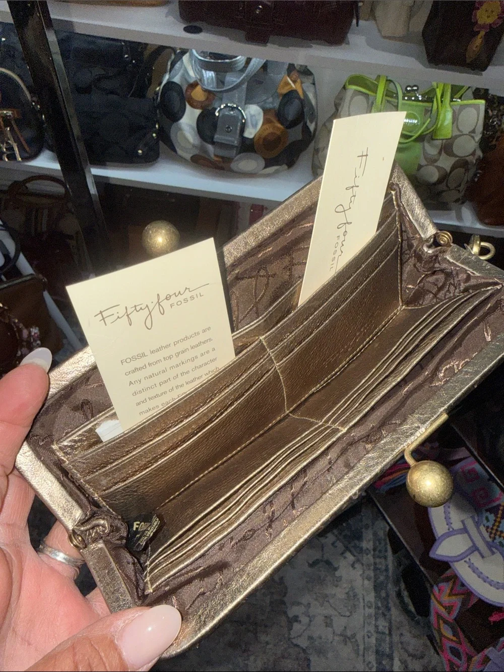 Fossil wristlet metallic